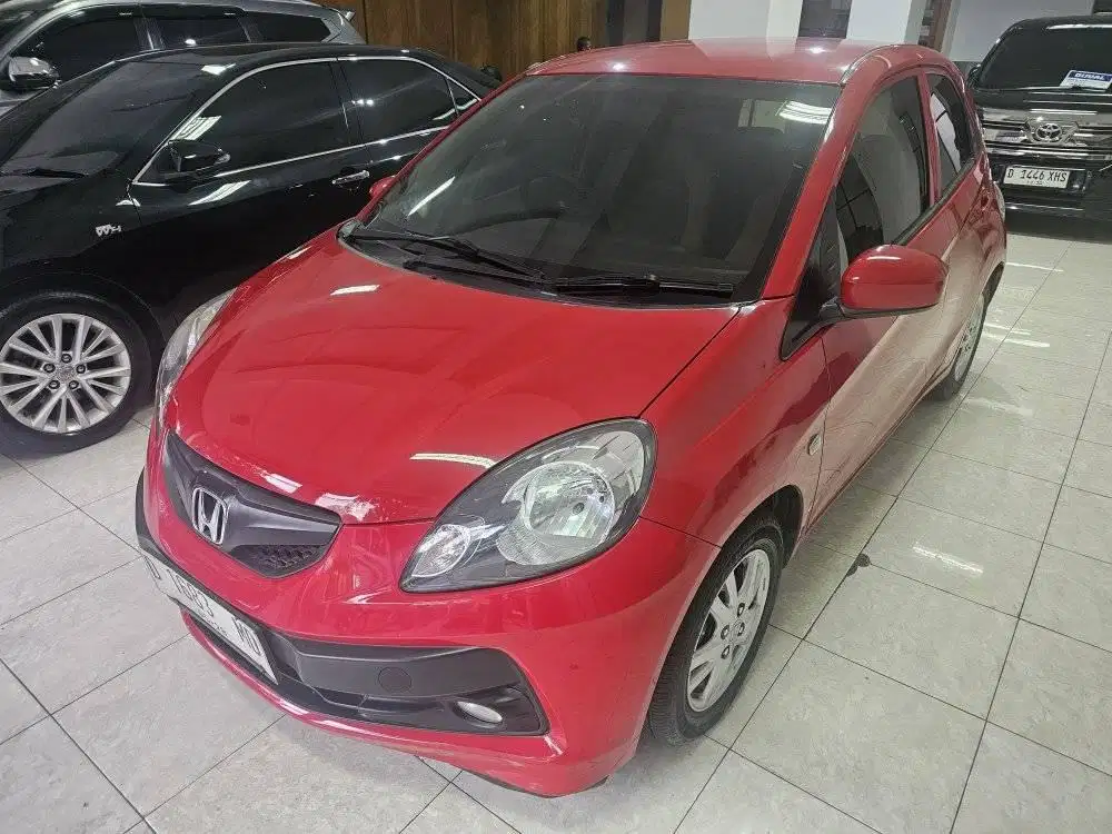 Honda Brio 1.2 E at 2014 merah, km 97rb, terawat skl, service recore.
