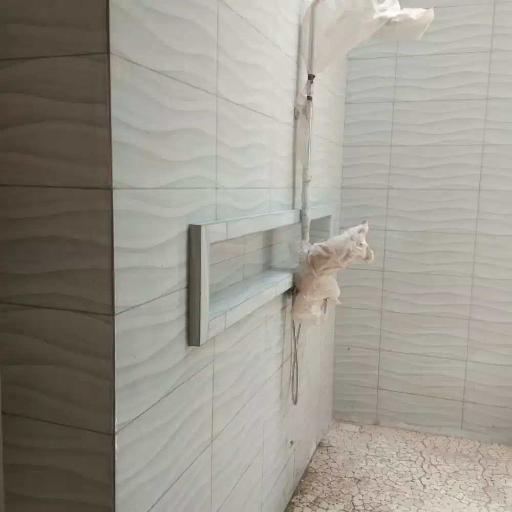 terima jasa pasang keramik batu alam plester aci dll