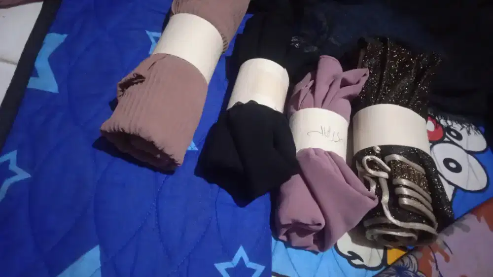 Kerudung bosku bekas kondisi masih baru