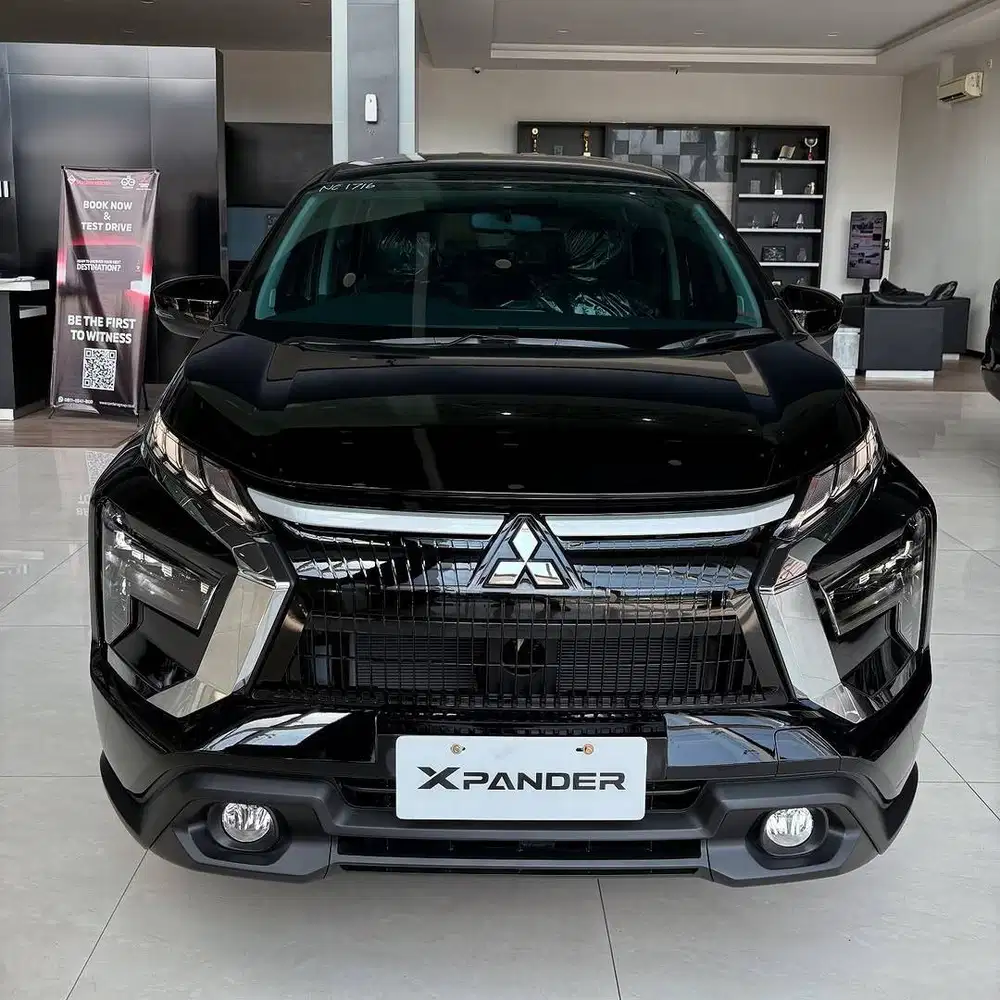 DP 9 JUTA XPANDER EXCEED TOURER CVT