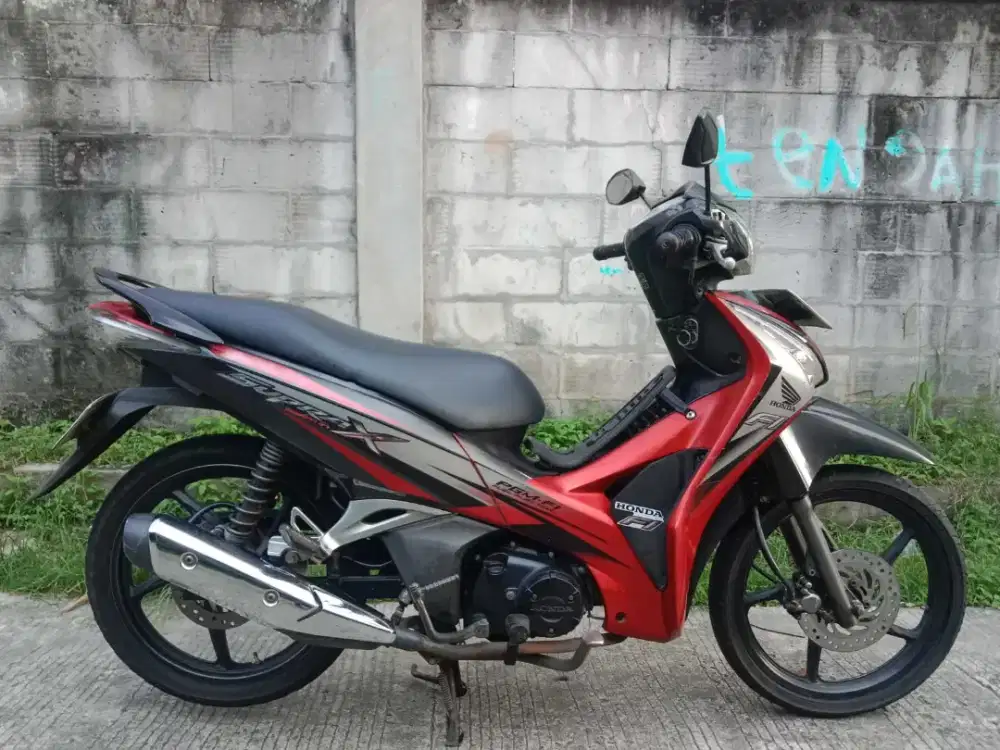 Honda Supra x125 cw fi helm in tinggal gass