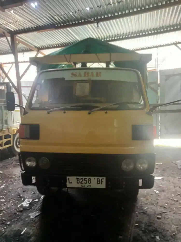 Truk Mitsubishi Colt Diesel Kuning tahun 1980 Aktif Lengkap Surat