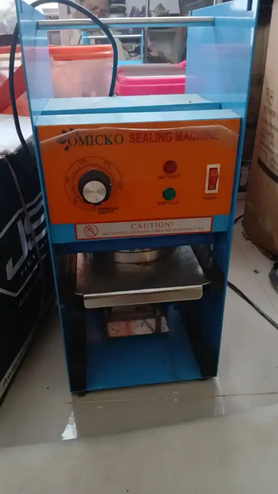 Cup sealer omicko