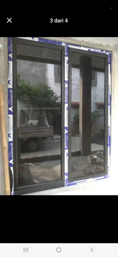 Jendela aluminium dobel daun T200cm L120cm hrg terpasang 2,4 jt /unit