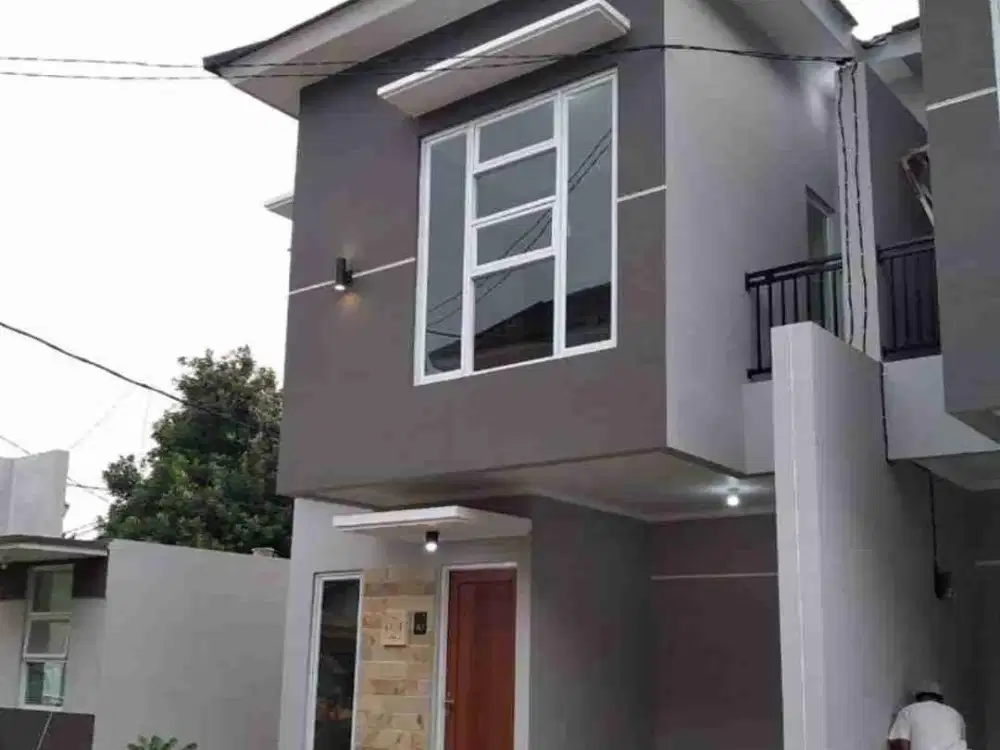 Dijual rumah 2 lantai plus isi perabotan nya di Beji Dspok