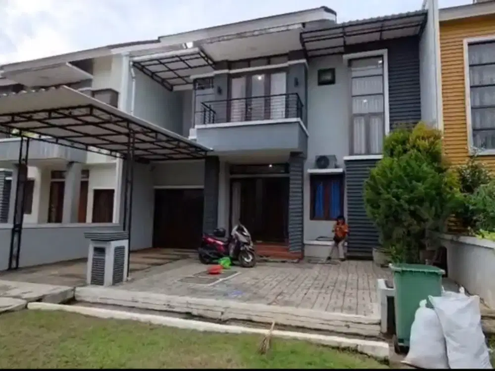 Disewakan rumah siap huni semi furnished  di cluster heliconia harapan indah 2 bekasi  Harga 75 juta nego