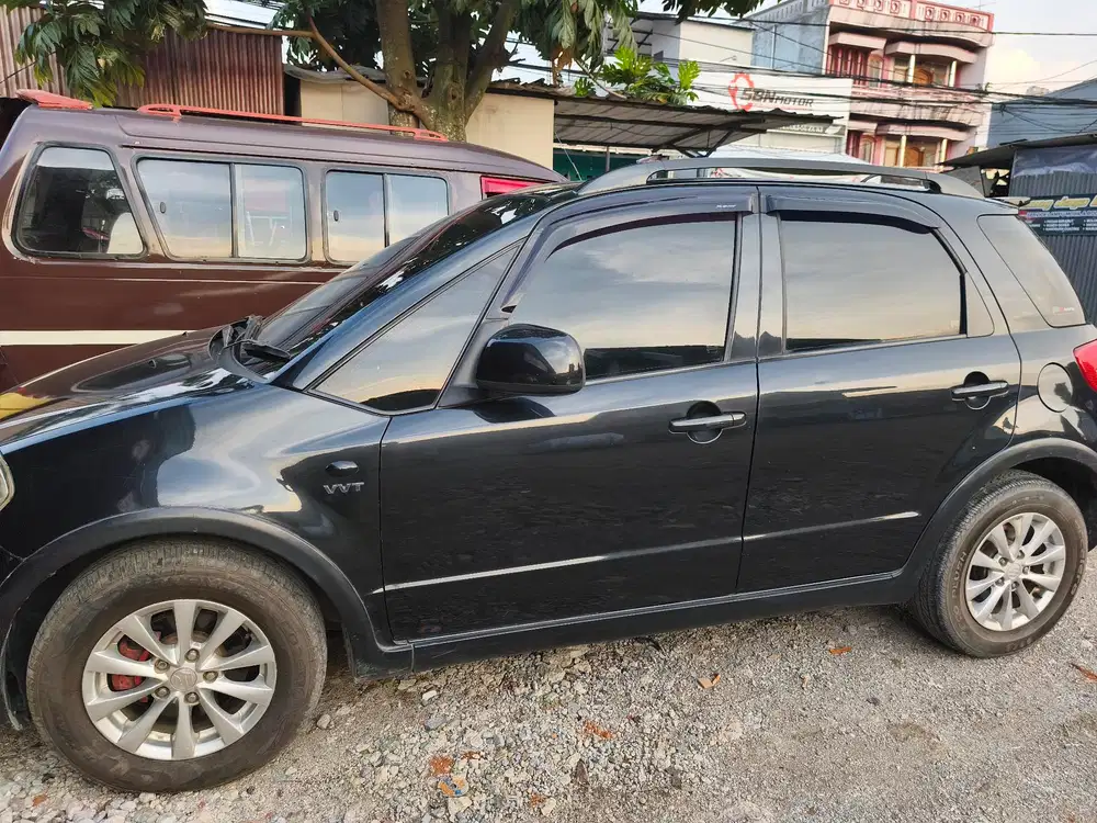 Suzuki SX4 2009 Bensin