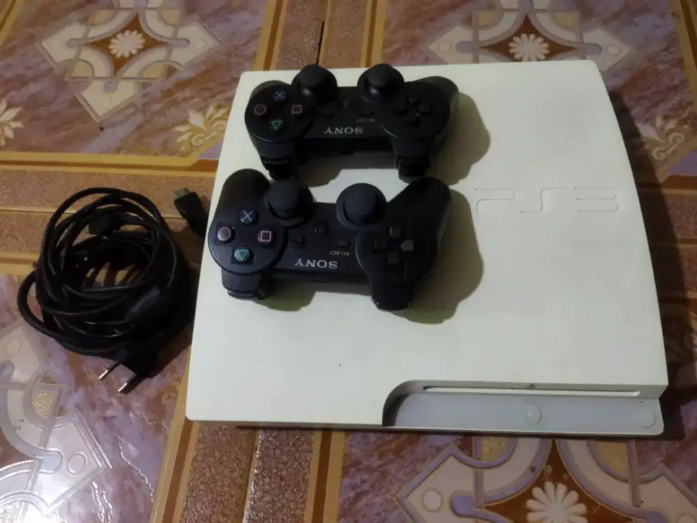 PlayStation 3 model CECH-3000A, alias PS3 Slim seri 3000.