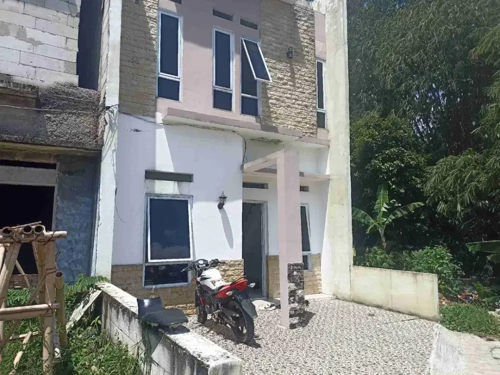 jual rumah dua lantai harga satu lantai