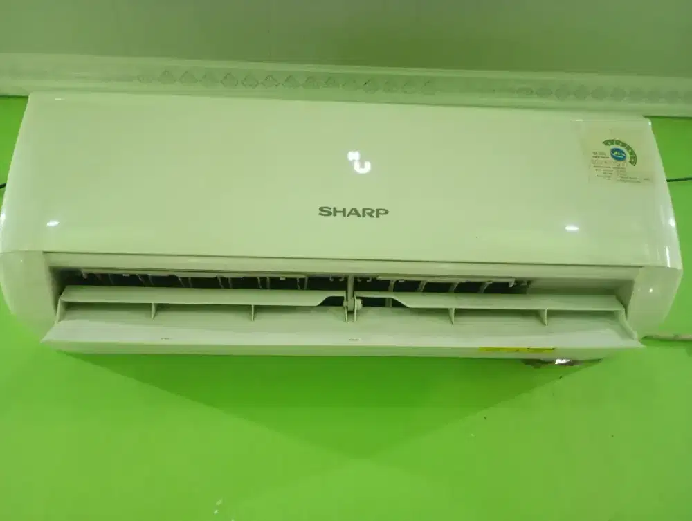 Ac Sharp UCY 1/2 pk masih dingin normal