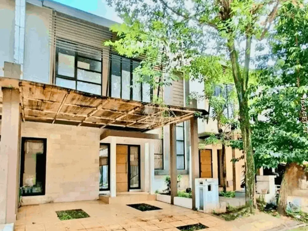 Rumah Modern dengan masih ada Halaman Belakang di Discovery, sektor 7, Bintaro Jaya.
