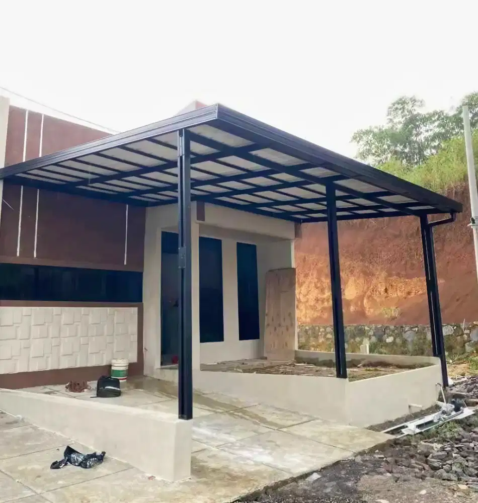 Kanopi baja ringan dan garasi