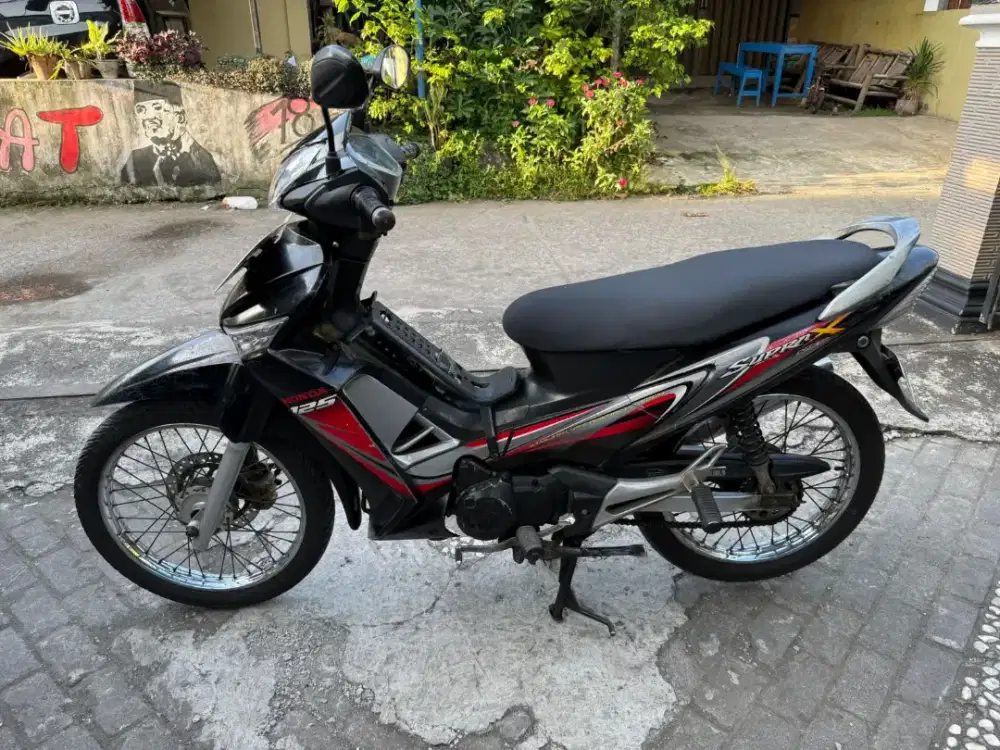Supra 125 karburator THN 2010 plat AB Kota
