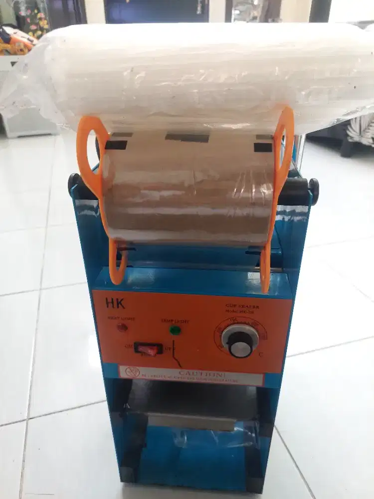 Mesin cup sealer merk HK