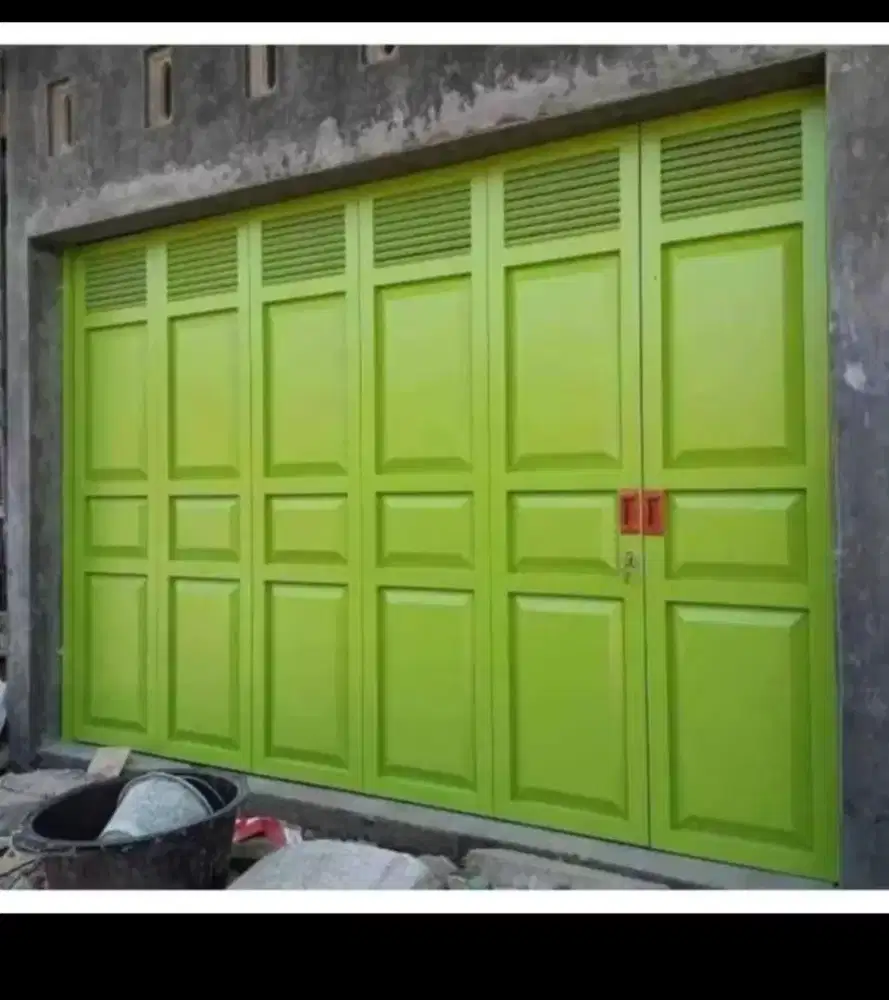 JASA PEMBUATAN PINTU BESI DLL