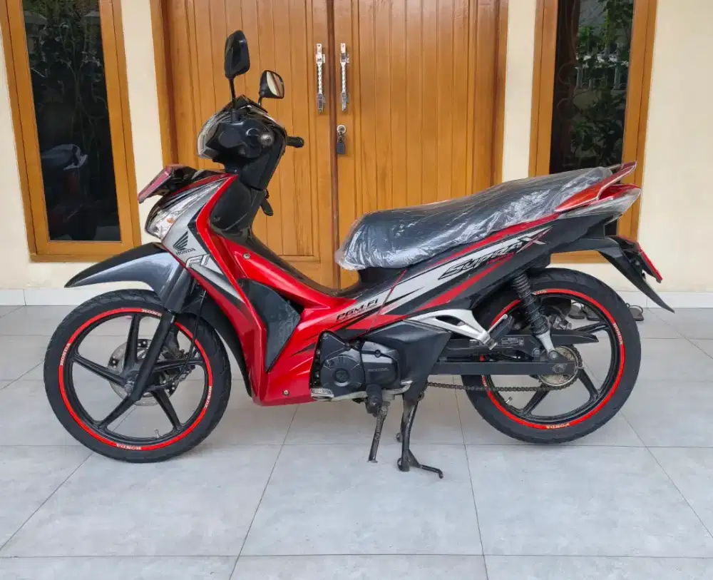 SUPRA X 125 HELM IN PGM FI 2012