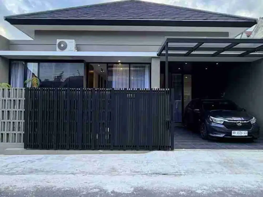RUMAH BARU INDUSTRIAL MODERN - FURNISHED DI DALAM PERUMAHAN ONE GATE SYSTEM DI JALAN KALIURANG KM. 14