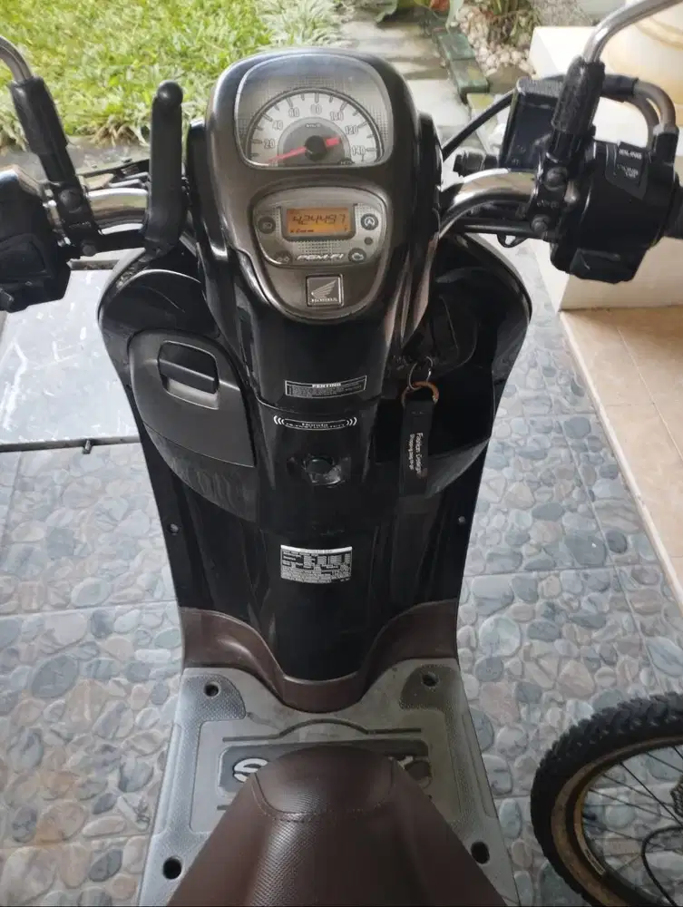 scoopy km rendah