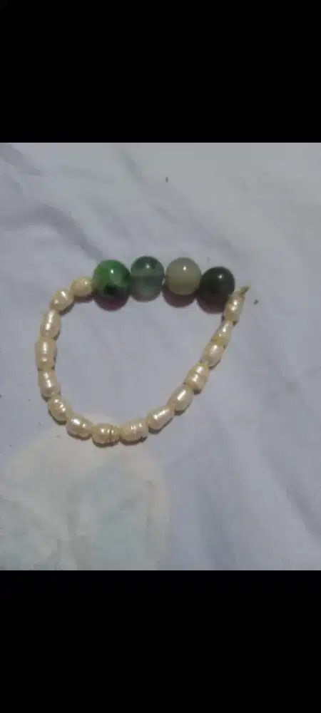 Mutiara air tawar asli dan giok