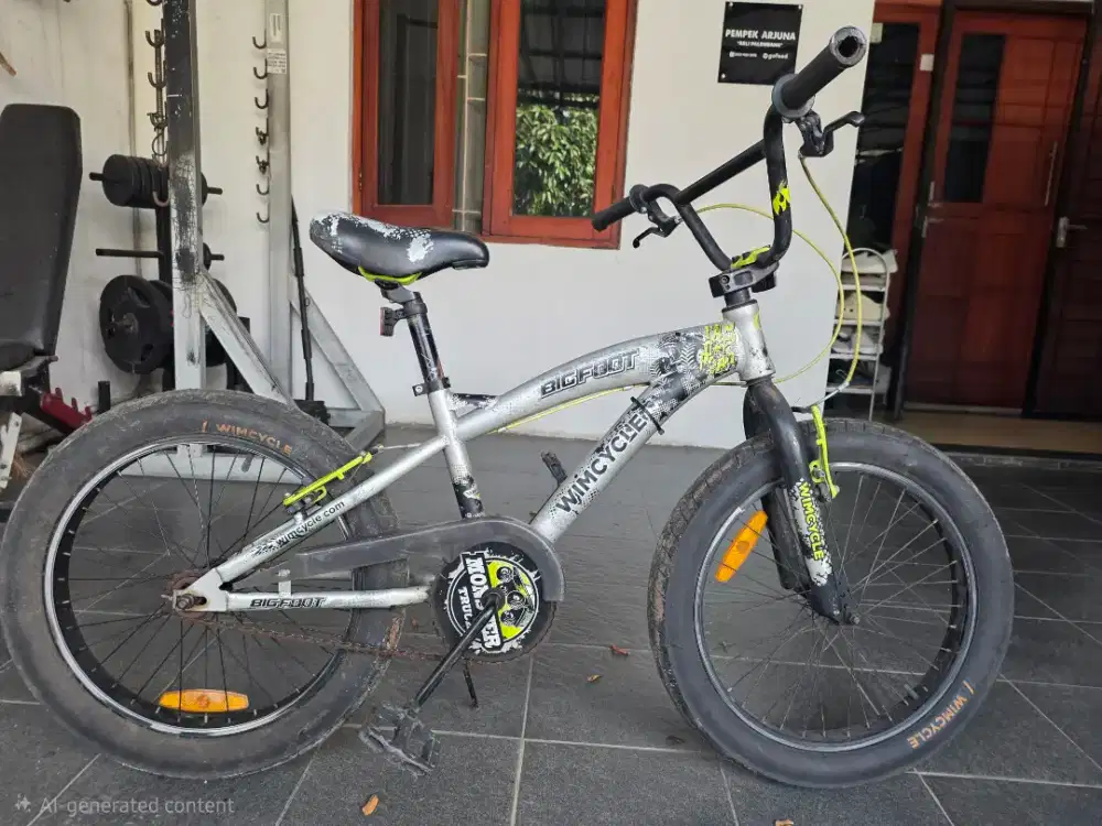 Sepeda wimcycle bigfoot, anak 6-10 tahun