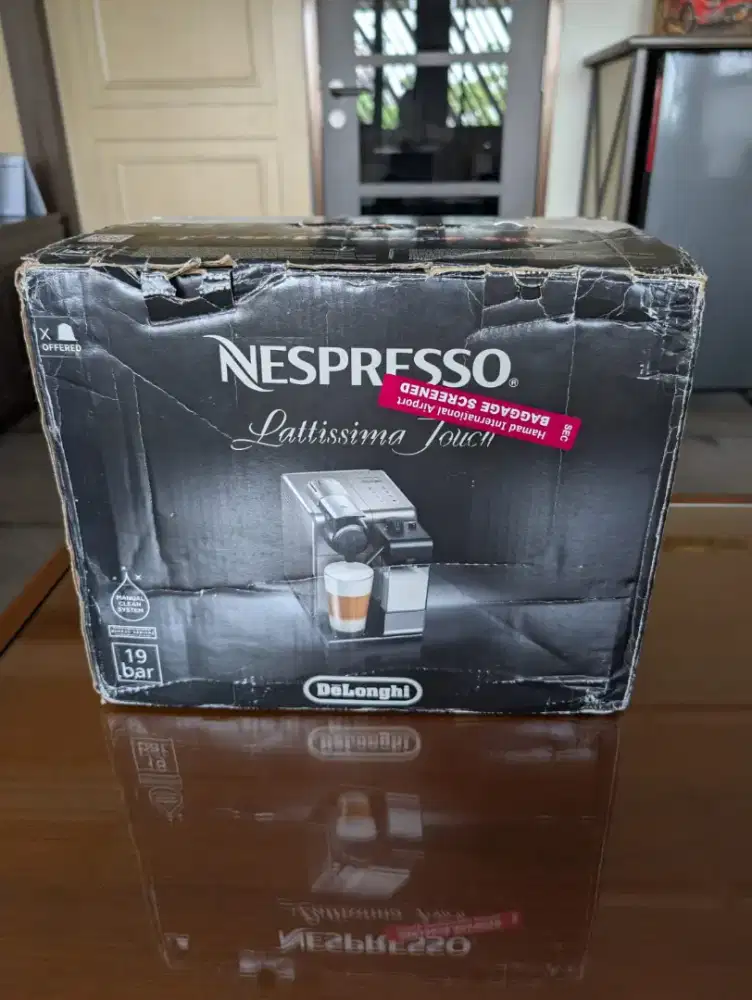 Nespresso DeLonghi Lattissima Touch
(Made in Italy)