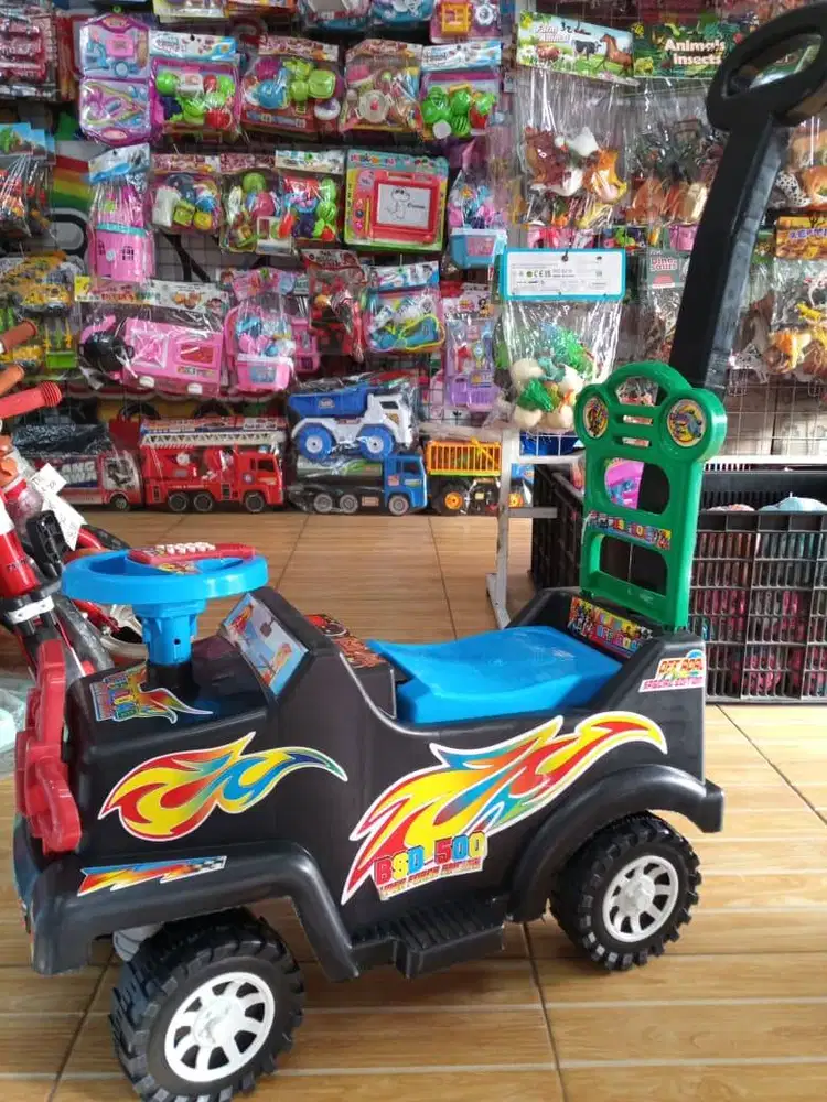 mainan anak mobil naik musikk