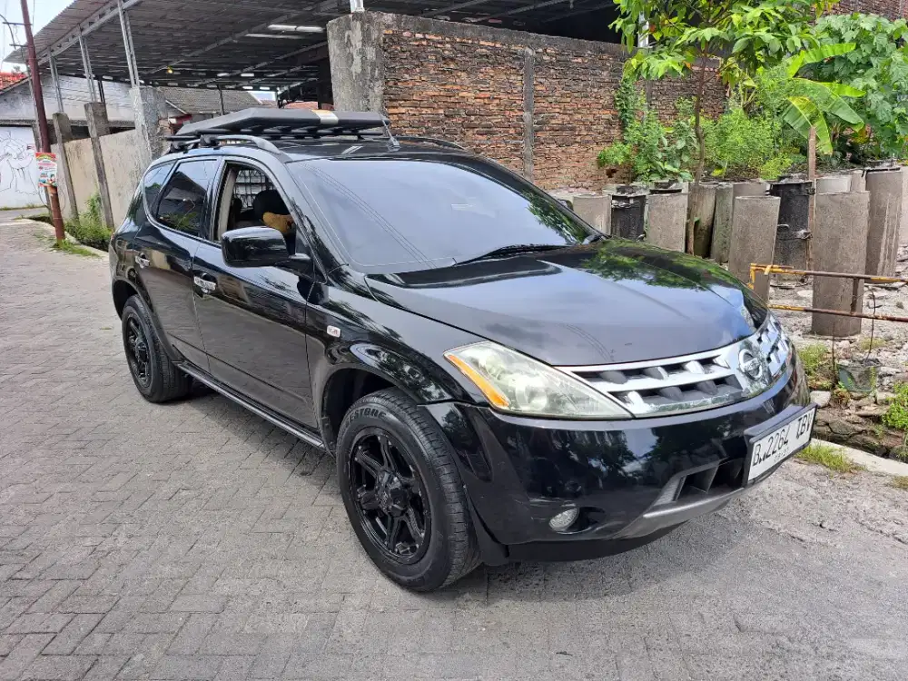 Nissan Murano AT klimis dp 20jt
