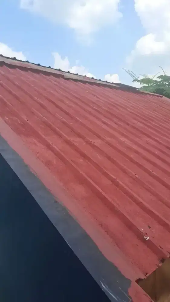 Perbaikan atap dan bongkar pasang atap