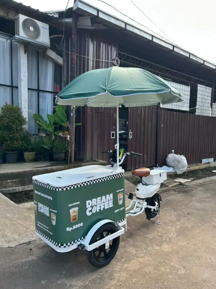 Rider untuk Kopi Keliling Sepeda Listrik