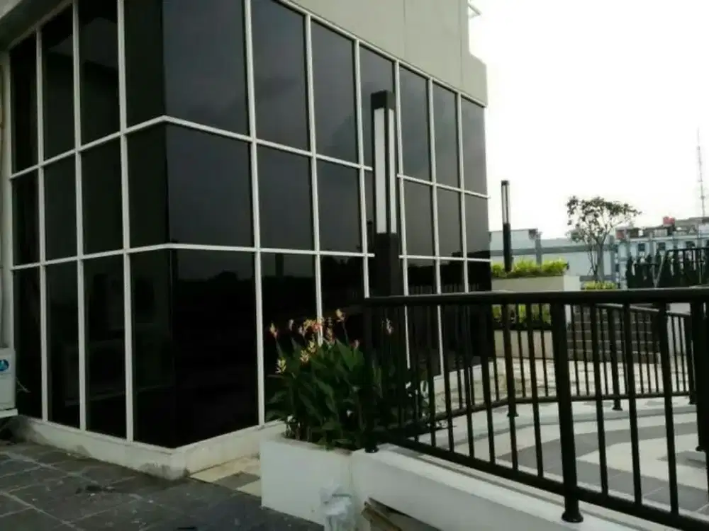Kaca film penolak panass oneway rayben gedung rumah kanopi / ruko