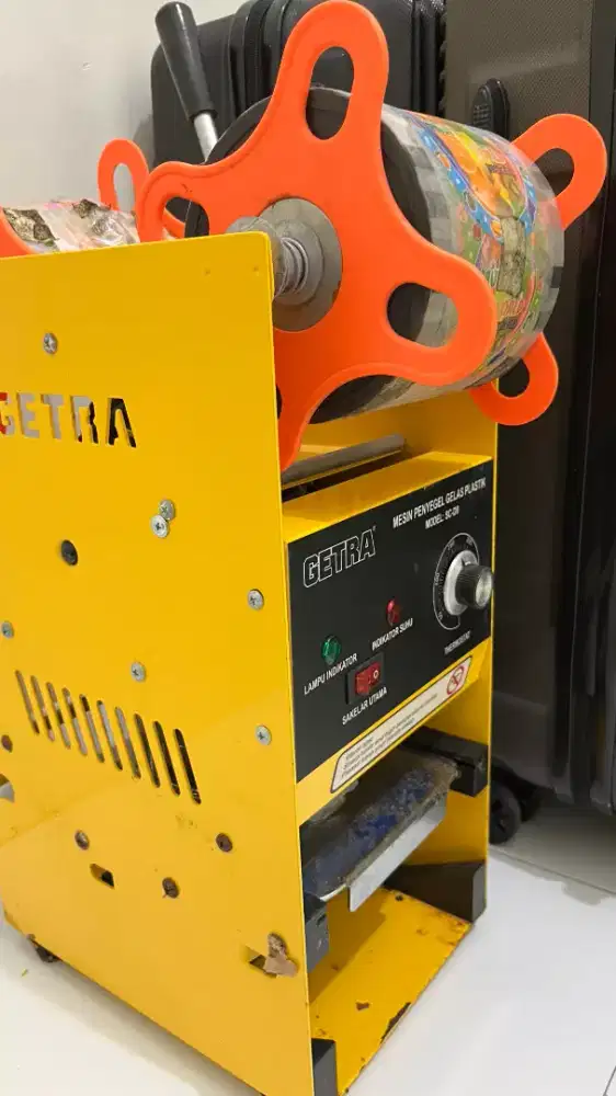 Mesin press gelas plastik
