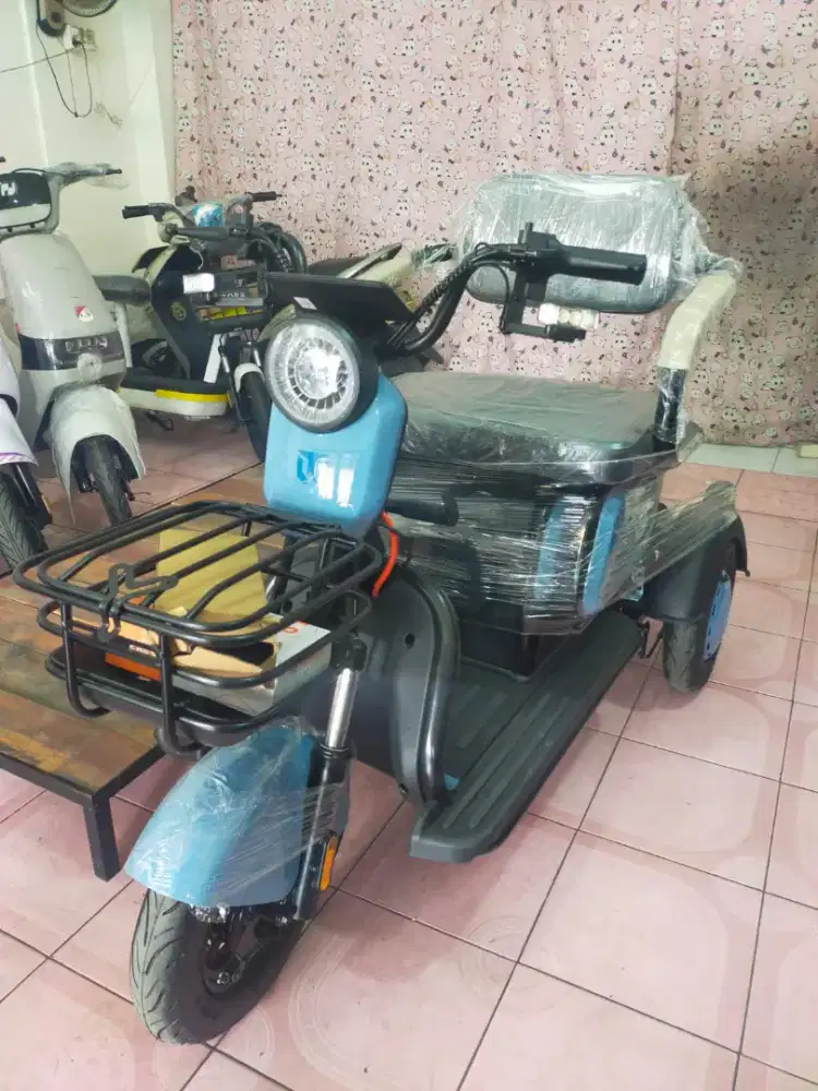 Sepeda listrik roda tiga tora