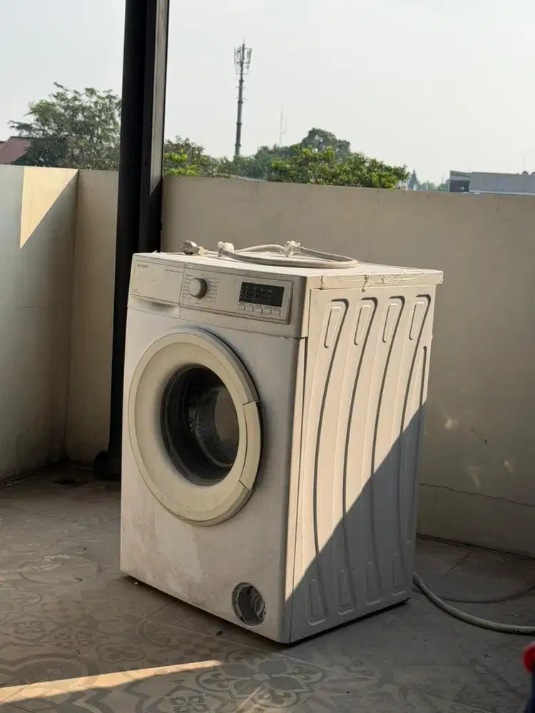 Mesin cuci front load sharp