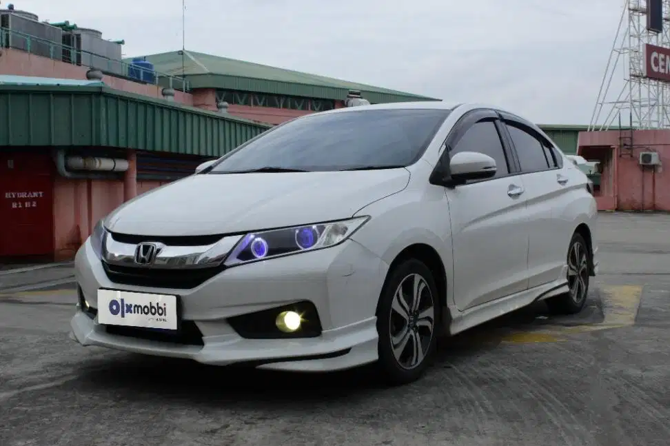 LOW DP Honda City 1.5 E Bensin-MT 2014 XLA