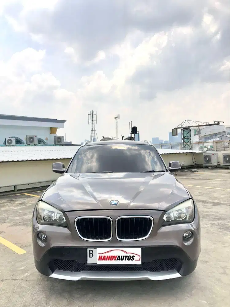BMW X1 Executive Tahun 2011 Automatic Coklat Metalik