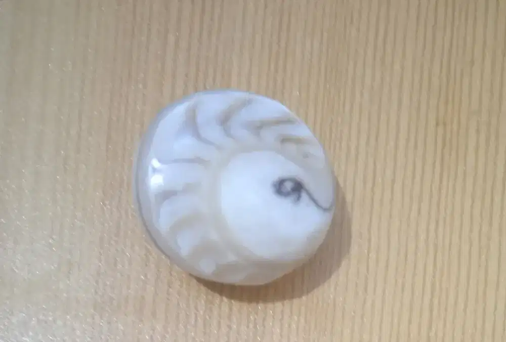 Batu mustika KEONG RAMBUT antik