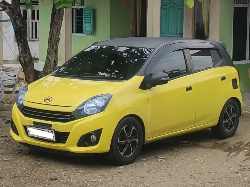 Ayla 1.0 X M/T 2021 kuning