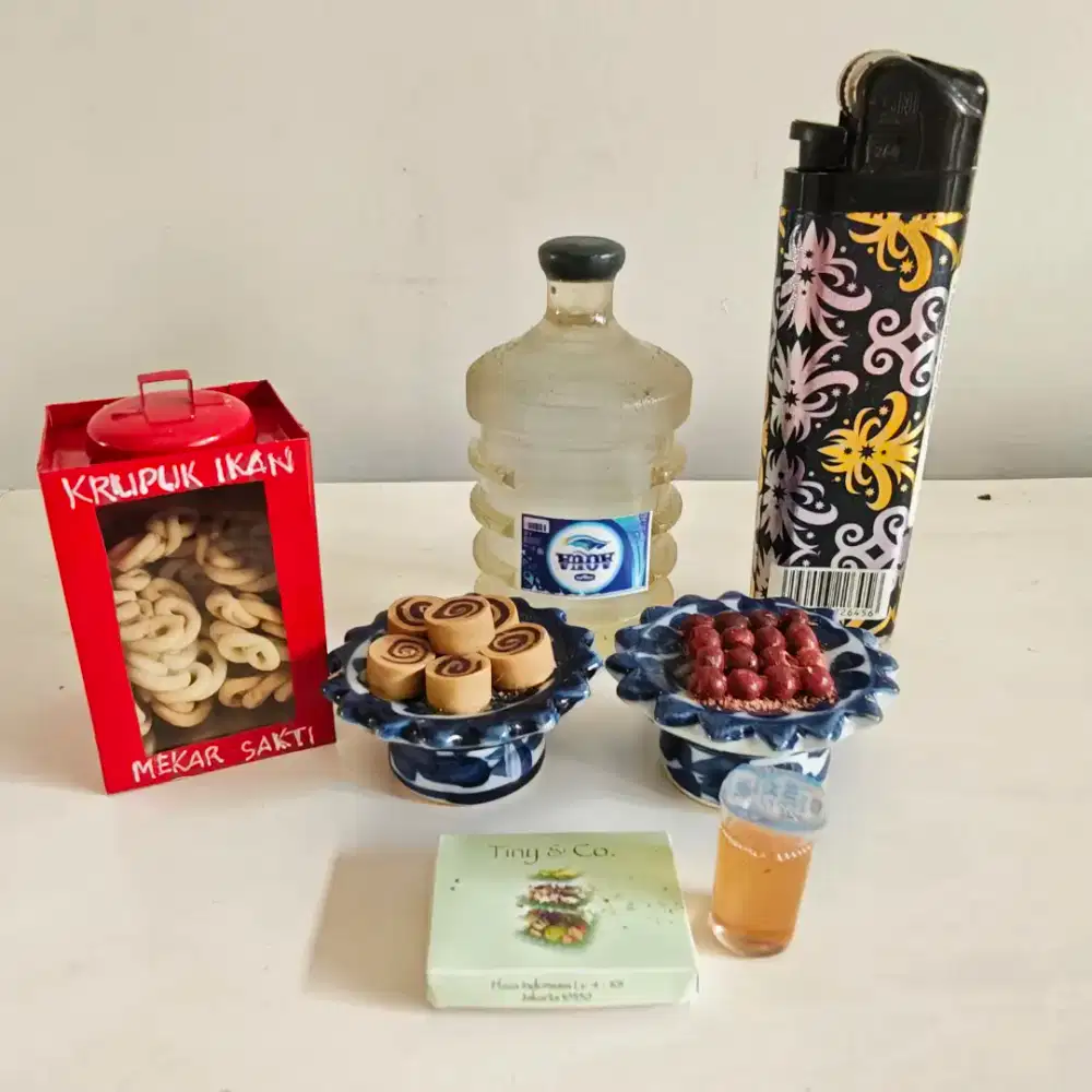 Pajangan miniatur take all