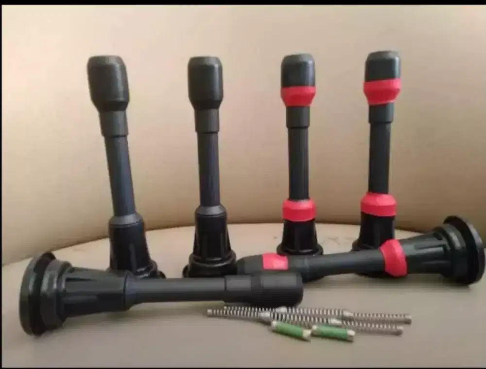 Selongsong protektor batang koil coil nisan xtrail livina evalia march