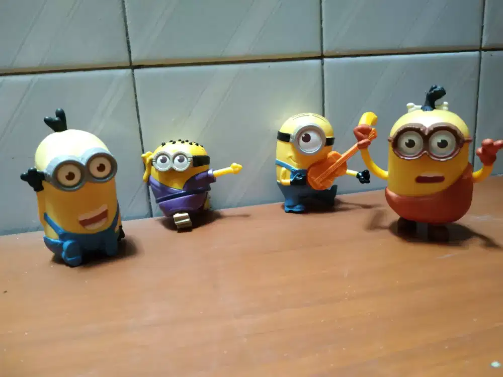 Four cute beautiful minions