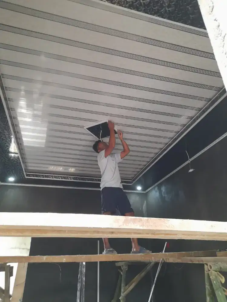 Tukang cat dan atap bocor