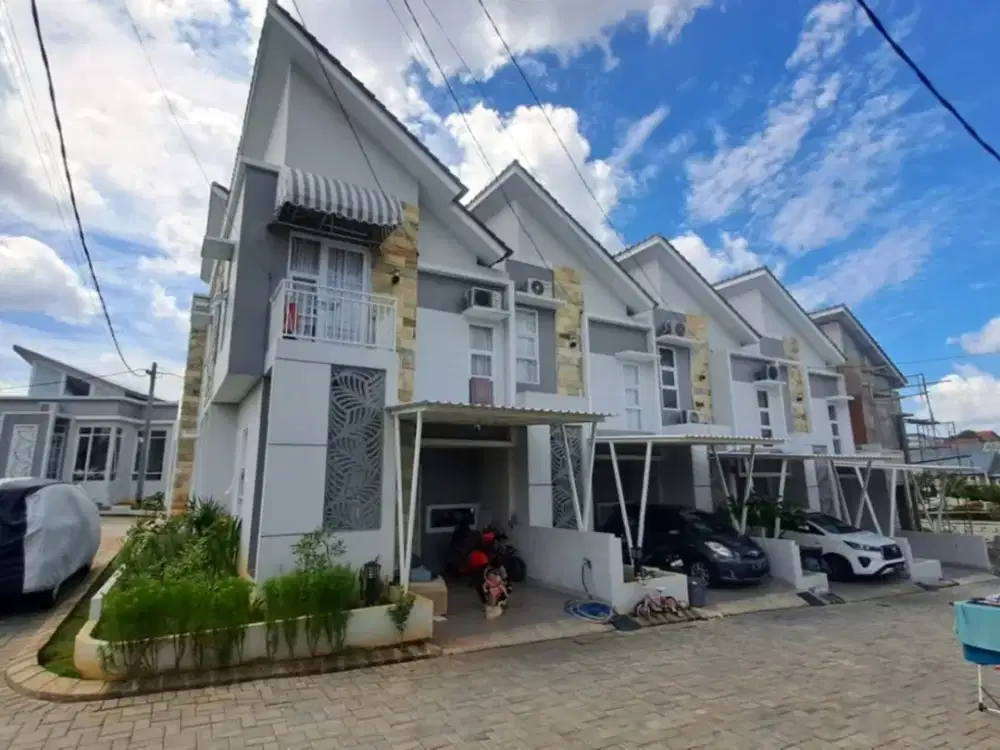 Rumah 2 Lantai Depok Hunian Syariah Modern Termurah di Medina Townhouse Depok Strategis dekat Tol dekat Stasiun Depok Baru Nyaman Asri Bebas Riba