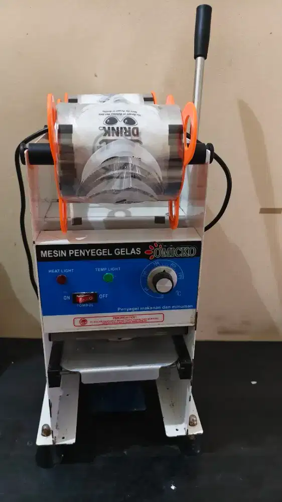 Omicko sealing cup machine second