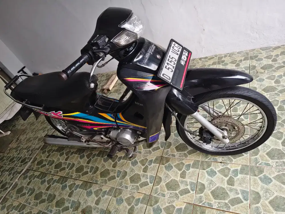 Honda supra x tahun 2004