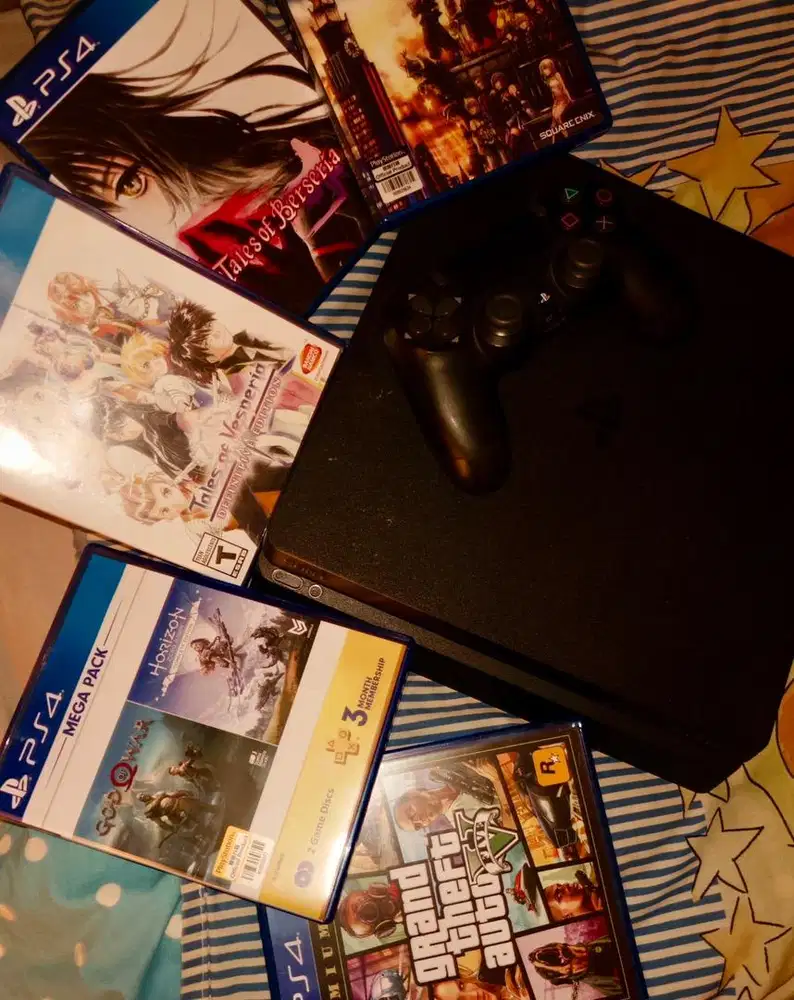 PS4 (Slim, 1 TB, 6 extra game disc)