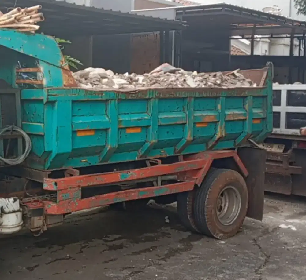 Urugan Atau Buang sisa puing tanah dan smph