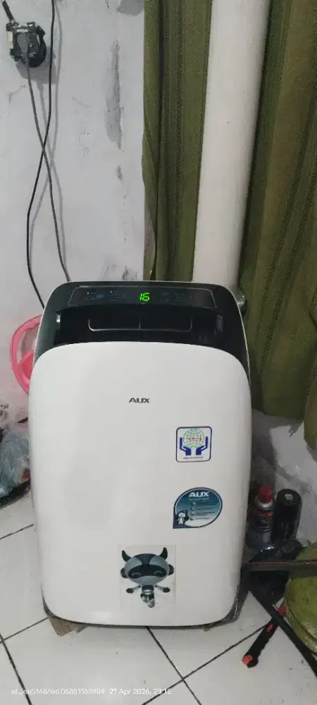 AC portable aux 1,5 pk dingin menggigil