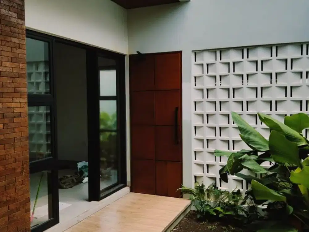 Rumah 2 Lantai Akses ke Fasilitas Umum Disewakan, di Puri Gading Area