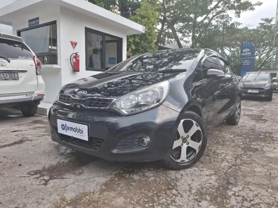 DP MURAH Kia Rio 1.4 Bensin-MT 2014 Hitam CXGLD