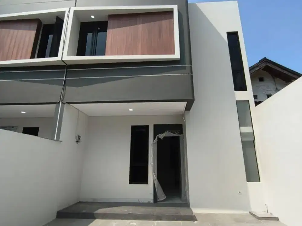 Dijual Rumah 1M-an Modern Dekat MERR Pakuwon City